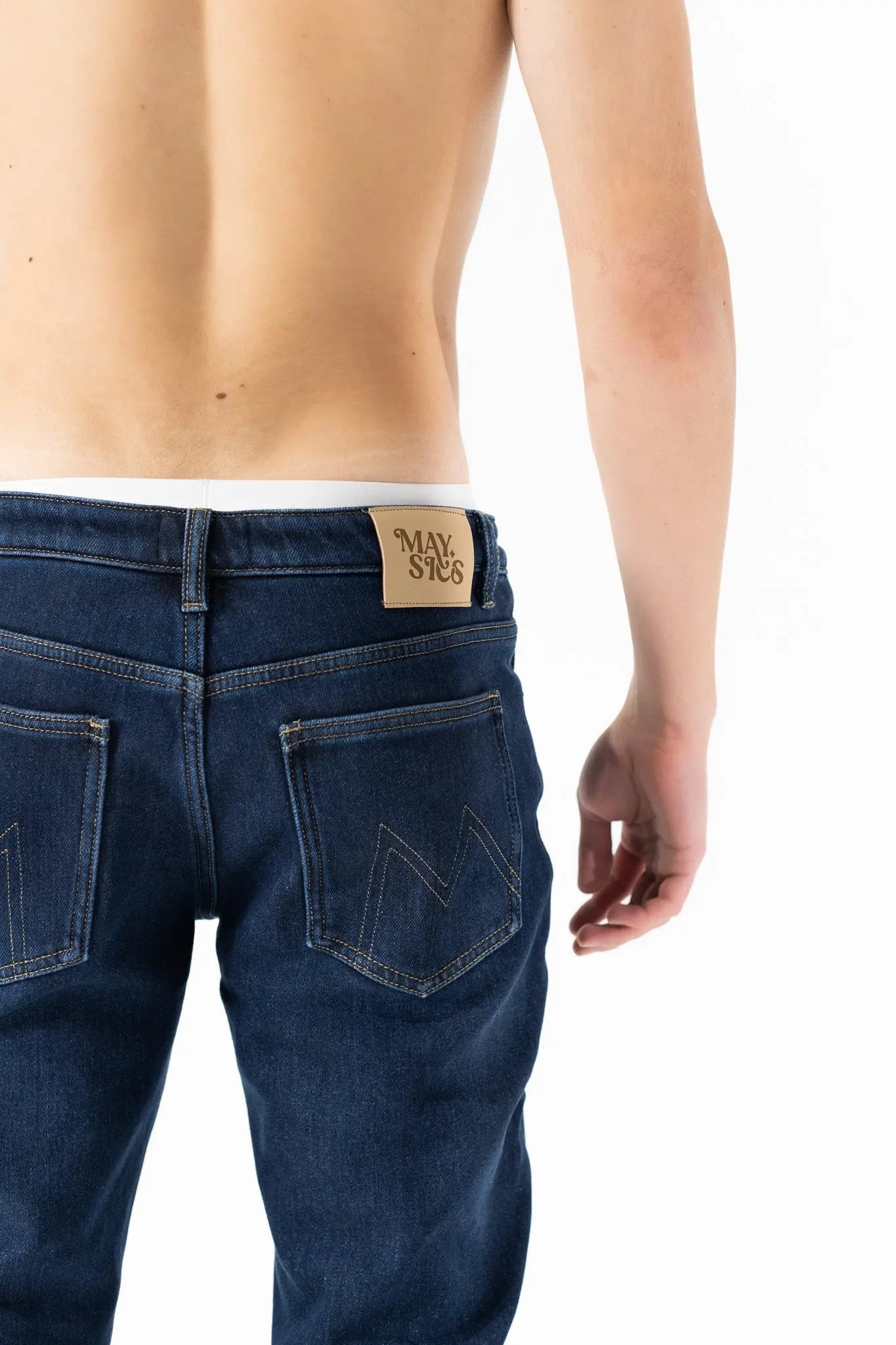 Mayscs fleece toasty jeans showing leather tag and back pocket details